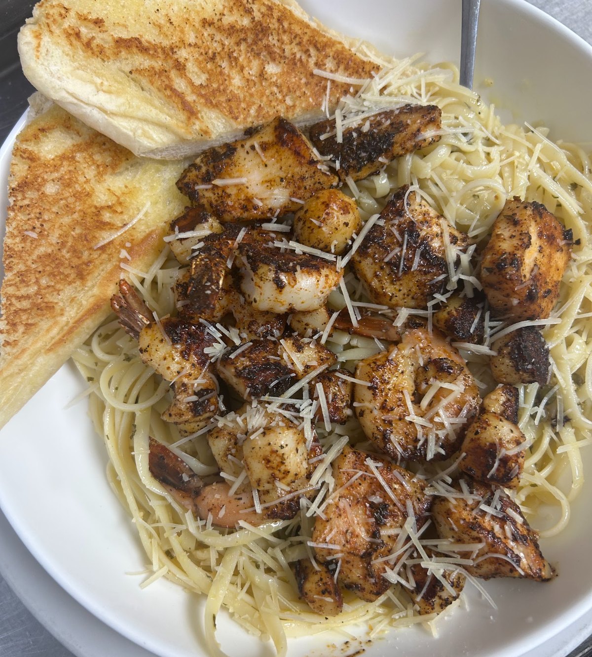 Blackened shrimp and scallop seafood pasta