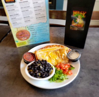 Enchilada plate with black beans at Molly Goodhead's