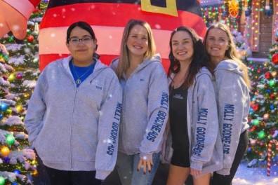 Molly Goodhead's crew in matching hoodies at the holidays
